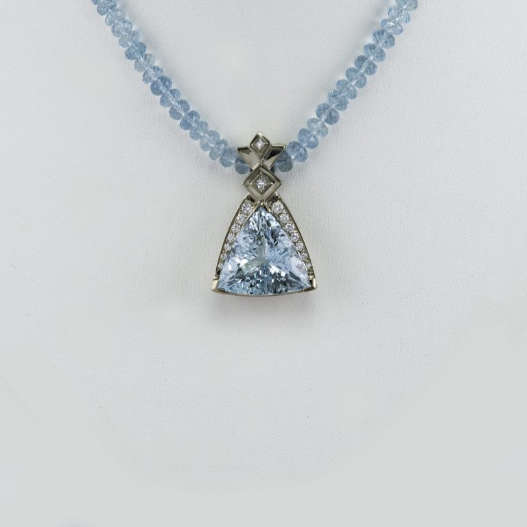 Aquamarine pendant with diamond accents in 14kt white gold