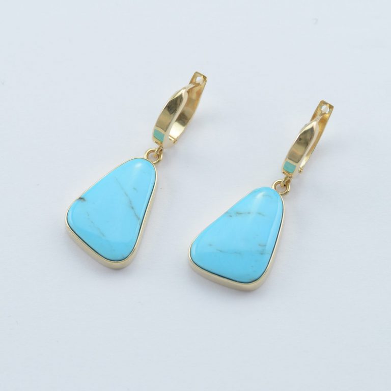 Turquoise earrings set in 14kt yellow gold
