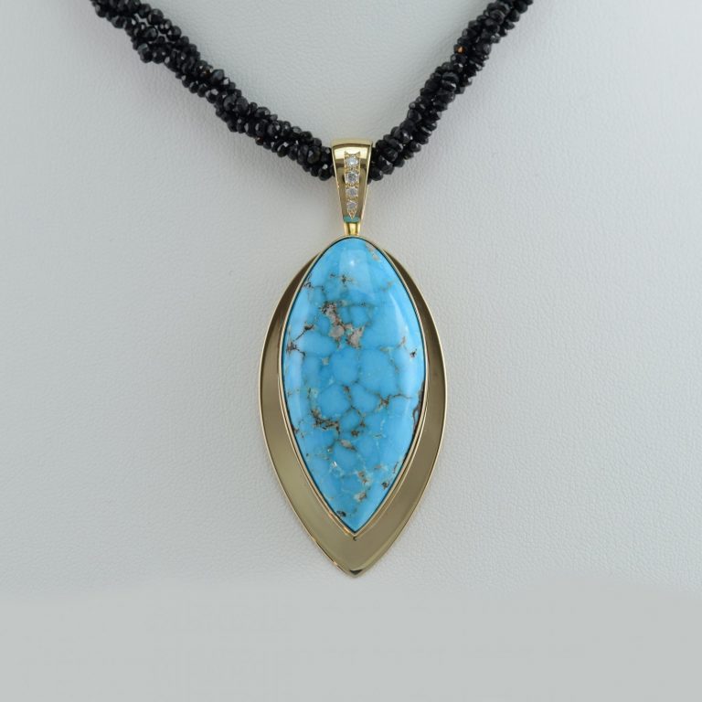 Pinto valley turquoise pendant with diamonds