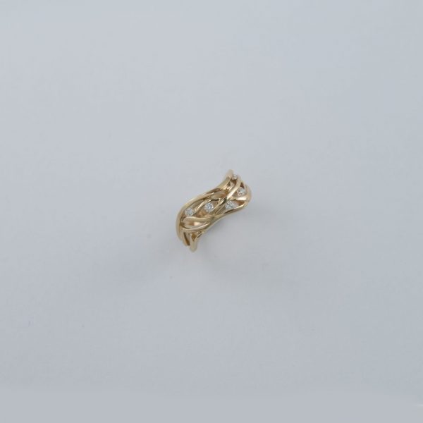 Diamonds in a Narrow Snake River ring cast in 14kt yellow gold
