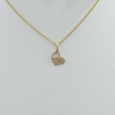 Small teton heart pendant in 14kt yellow gold. This is the smallest of teton heart pendants. The chain is not included in the price.