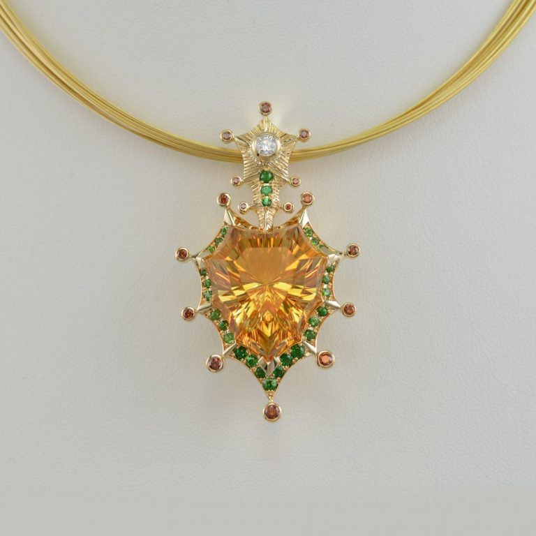 Concave cut citrine with diamonds and tsavorite garnets