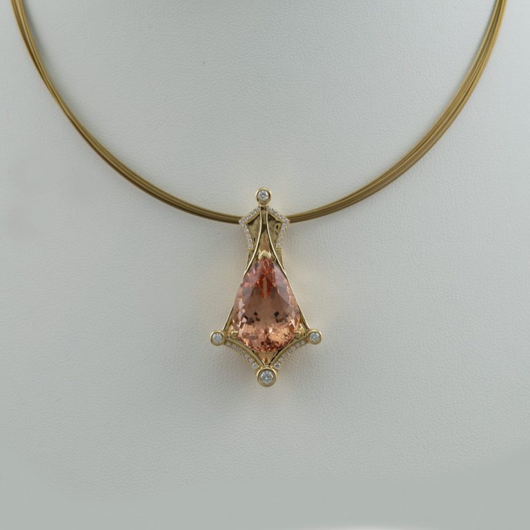 Morganite pendant with 18kt yellow gold and diamonds. This is a one of a kind and the necklace is not included in the price.