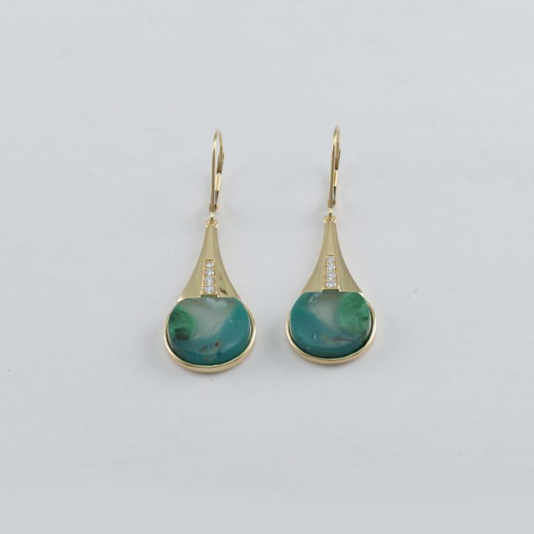 Chrysocolla earrings with diamond accents and 18kt yellow gold. This pair is one-of-a-kind and we have a pendant to match.
