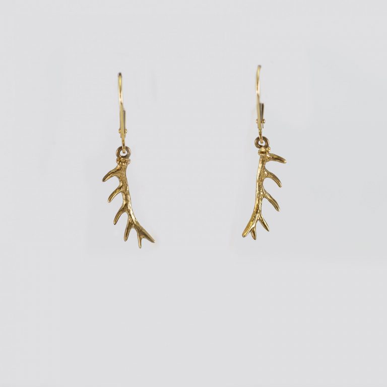This is a pair of our small gold antler earrings. They are on Leverbacks. They have been made using 14kt yellow gold. The leverbacks are also 14kt.