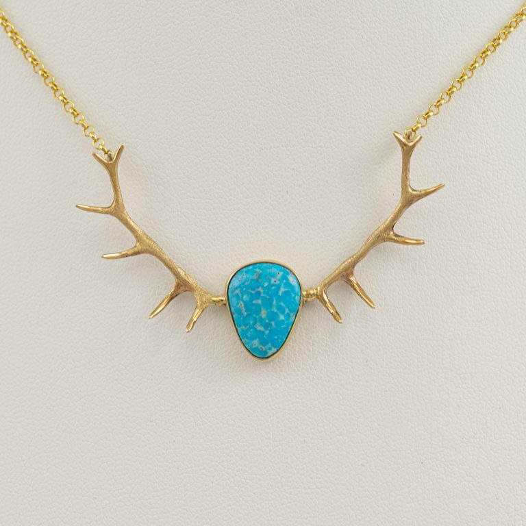 Waterweb antler necklace in 14kt yellow gold with 16" chain. The Turquoise is from the Kingman mine in Arizona. The chain is 16" in length.
