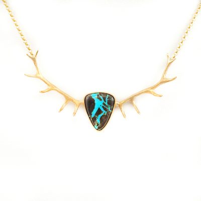 Turquoise antler pendant in 14kt yellow gold. Chain is included in the price. We have several versions of the Turquoise antler pendant.