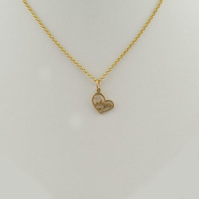 Small heart teton pendant in 14kt yellow gold with Diamond accent. The diamond is brilliant-cut. The chain is not included in the price.