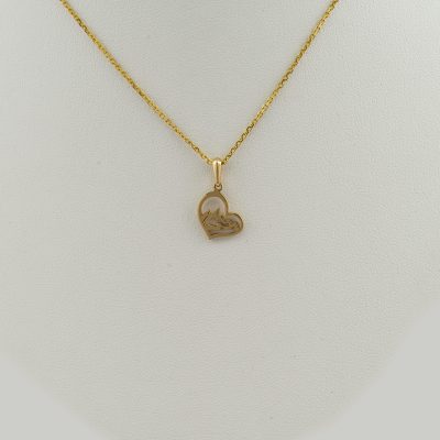 Small heart teton pendant in 14kt gold without a diamond. Available in 14kt white gold, 14kt yellow gold or Sterling Silver.