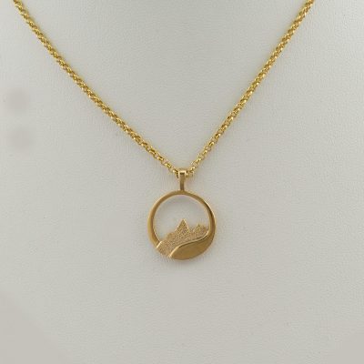 Teton flow pendant in 14kt yellow gold without a diamond. The chain is not included in the price. We offer a number of chains to go with this pendant.