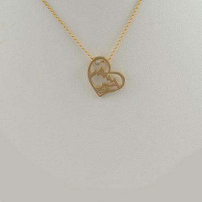 This is our large Heart Teton pendant with a Diamond. Also, available in 14kt White gold. The chain is not included in the price.