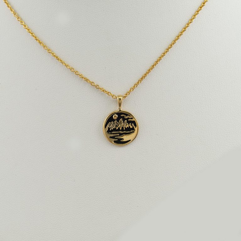 Sculpted Teton pendant in 14kt yellow gold. This pendant is also available in 14kt White gold and Sterling silver. Chain not included.