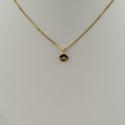 Tiny teton pendant in 14kt yellow gold. The chain is not included in the price. We also offer this pendant in 14kt white gold and sterling silver.