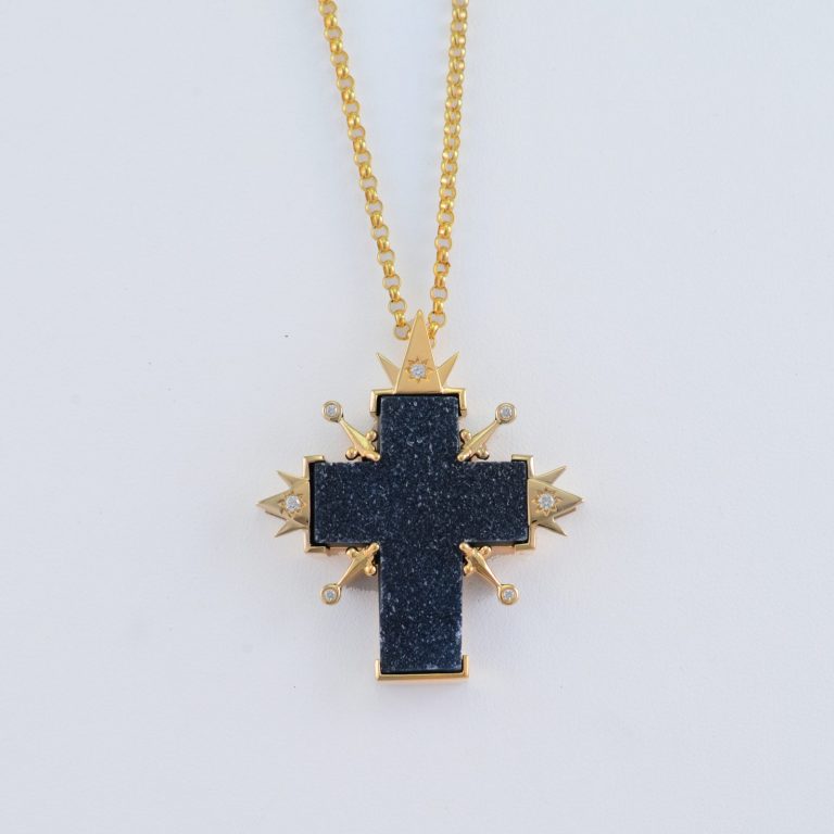 This Cross pendant was designed by Dan Harrison. It incorporates Black Druzy, 14kt yellow gold and Diamonds. The chain is not included.