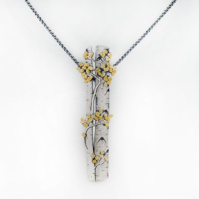 Large Aspen Pendant with Argentium Silver and Placer Gold. This pendant was designed and created by Wolfgang Vaatz. There are also earrings to match.