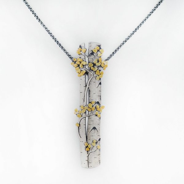 Large Aspen Pendant with Argentium Silver and Placer Gold. This pendant was designed and created by Wolfgang Vaatz. There are also earrings to match.