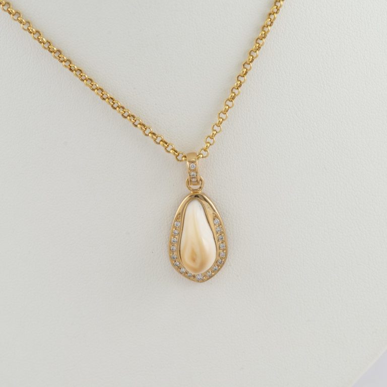 Elk Ivory and Diamond Pendant in 14kt yellow gold