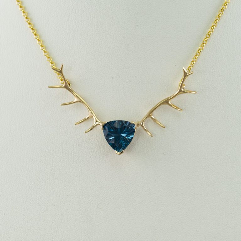 Blue Topaz antler necklace in 14kt yellow gold