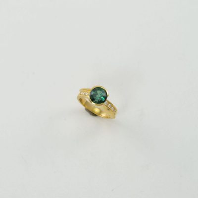 Green Tourmaline Ring with Diamond accents.
