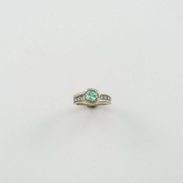 Cushion Cut tourmaline ring with blue diamond accents