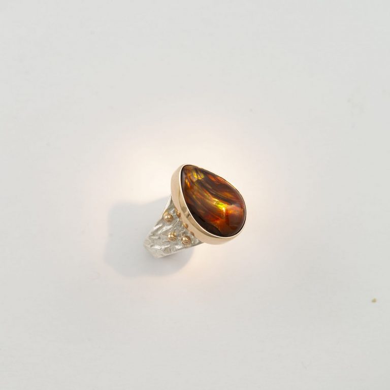 Men's fire agate ring with silver and gold