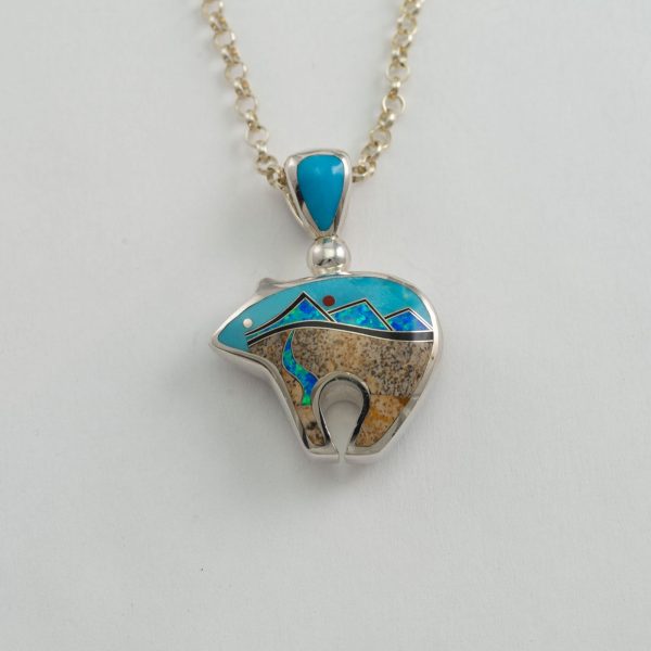 Reversible silver bear pendant with hand done inlay