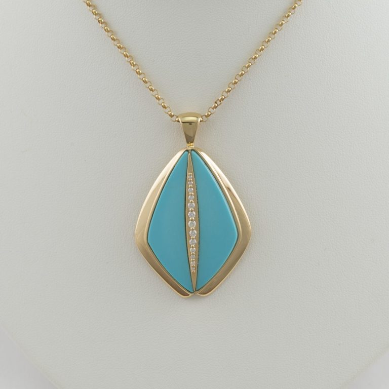 Turquoise pendant with diamonds and 18kt yellow gold