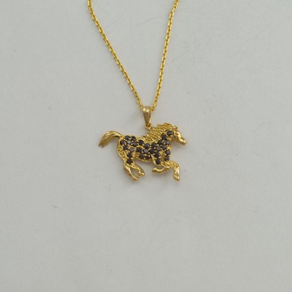 Diamond horse pendant in 14kt yellow gold