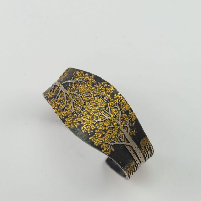 Silver aspen cuff with placer gold by artist Wolfgang Vaatz