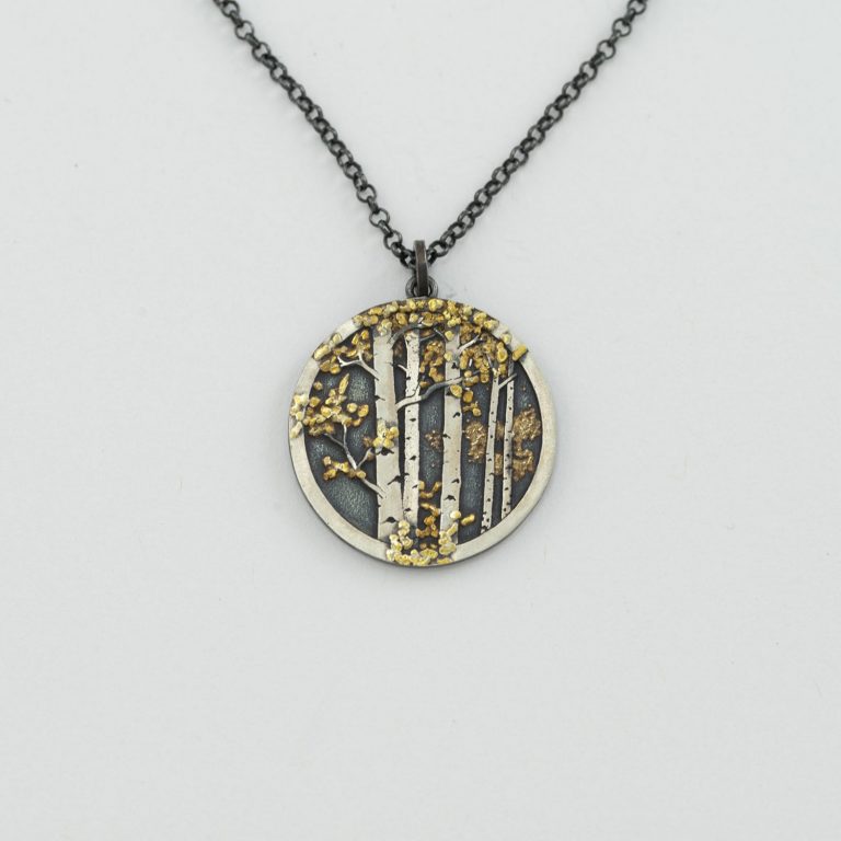 Round aspen pendant with silver and placer gold