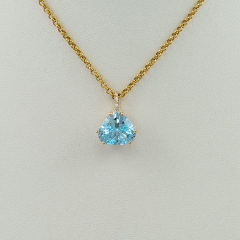 Blue topaz pendant with 14kt yellow gold and diamonds