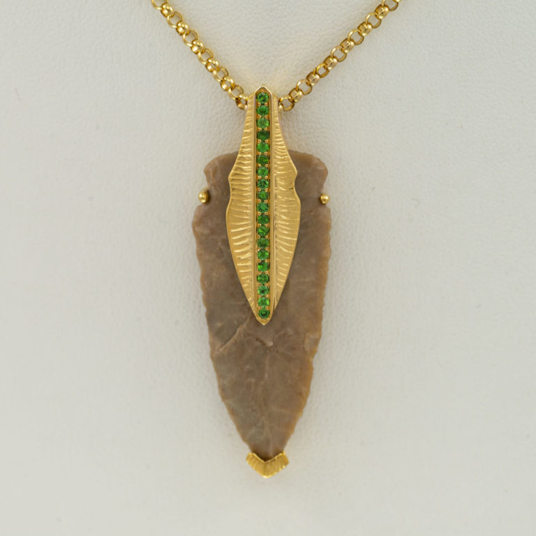 Apache arrowhead pendant with tsavorite garnet detailing