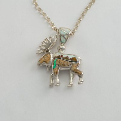 reversible sterling moose pendant with hand done inlay