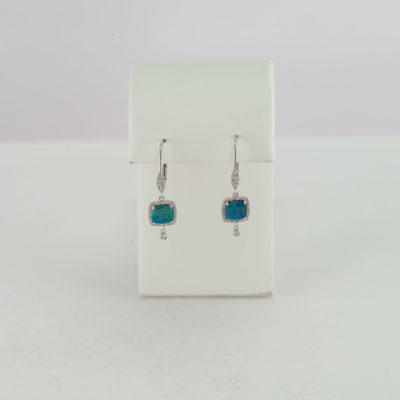Opal and white gold diamond earrings with diamond accents