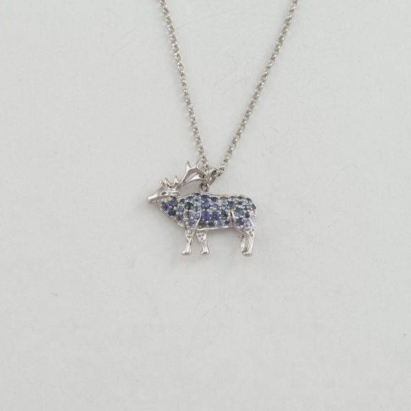 Reversible elk pendant with sapphires and white gold