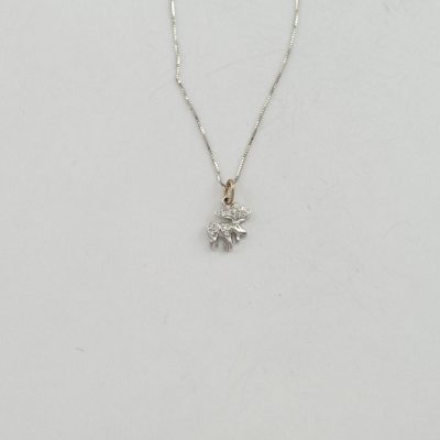 tiny diamond moose pendant in white gold