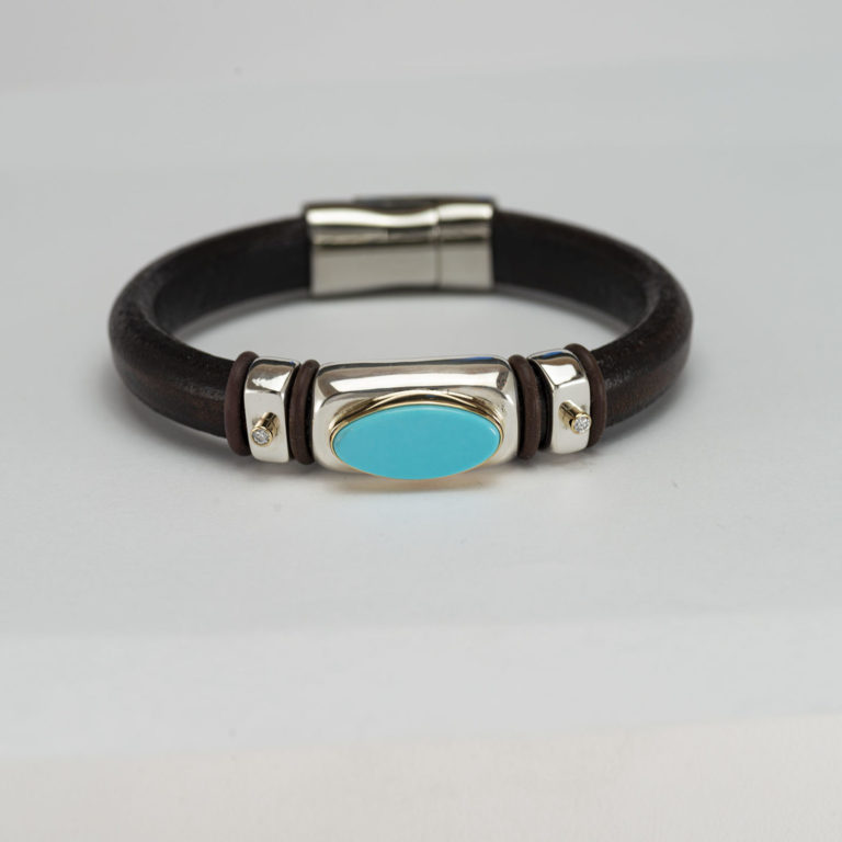 Leather and turqoise bracelet with silver, gold and diamonds