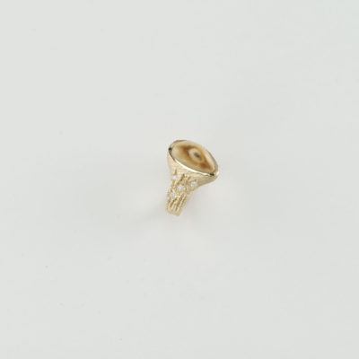 This bark style ring has an elk ivory center stone. It has diamond accents that are flush set in the 14kt yellow gold.