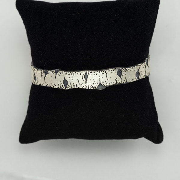 Silver Aspen cuff hand made by Wolfgang Vaatz. This quaking aspen collection also has earrings and pendants to match the cuff.