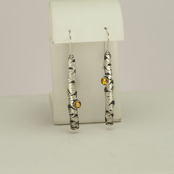 Citrine aspen earrings in argentium silver with french wire backings. This pair was hand made by Wolfgang Vaatz. We have a pendant to match.
