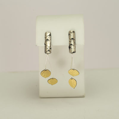 This pair of small quaking Aspen earrings were made with Sterling Silver, Argentium Silver and 18kt gold. We also have a longer pair if that is more to your taste.