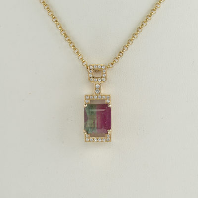 Bi color tourmaline pendant with gold and diamonds