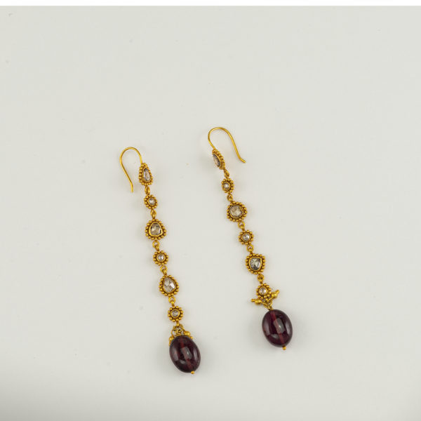 Here are a pair of Diamond and Tourmaline Earrings. Both the Tourmaline beads and Diamonds have been set in 14kt yellow Gold. The Diamonds are native cut and the backs are French wires.