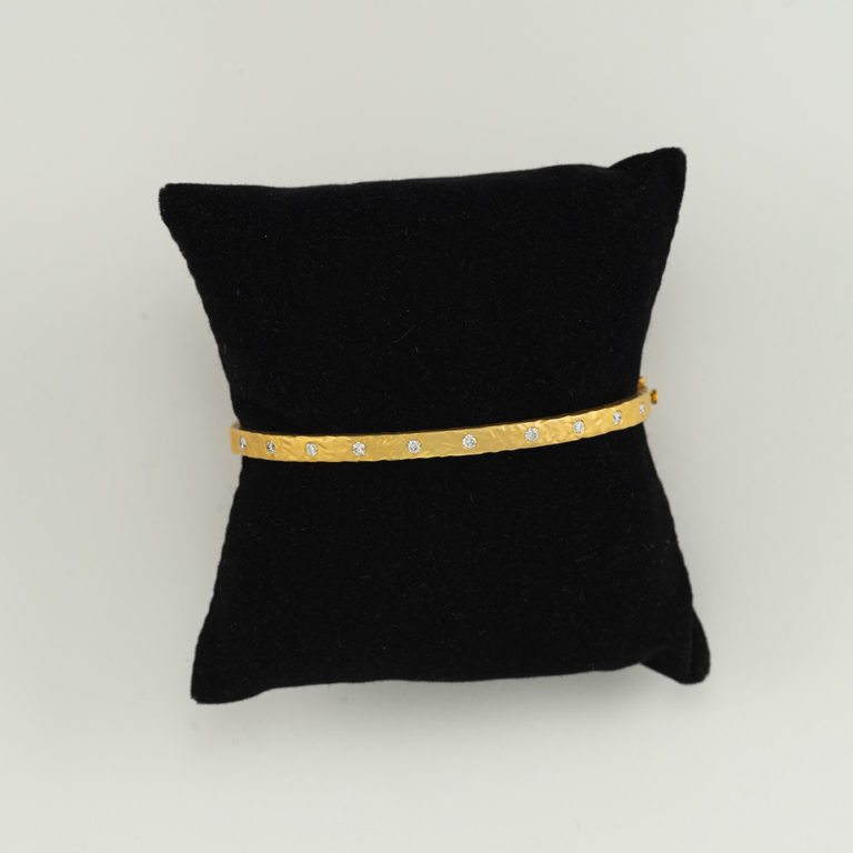 Here is our Diamond Bangle in 14kt yellow Gold. The Diamonds are 2.70cts in total weight.