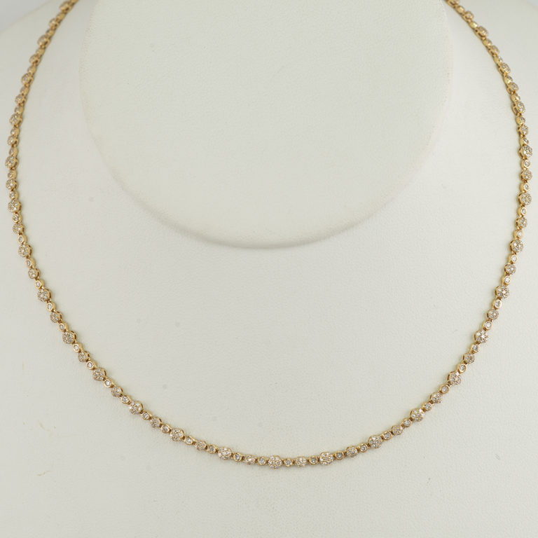 Diamond necklace in 14kt yellow gold.