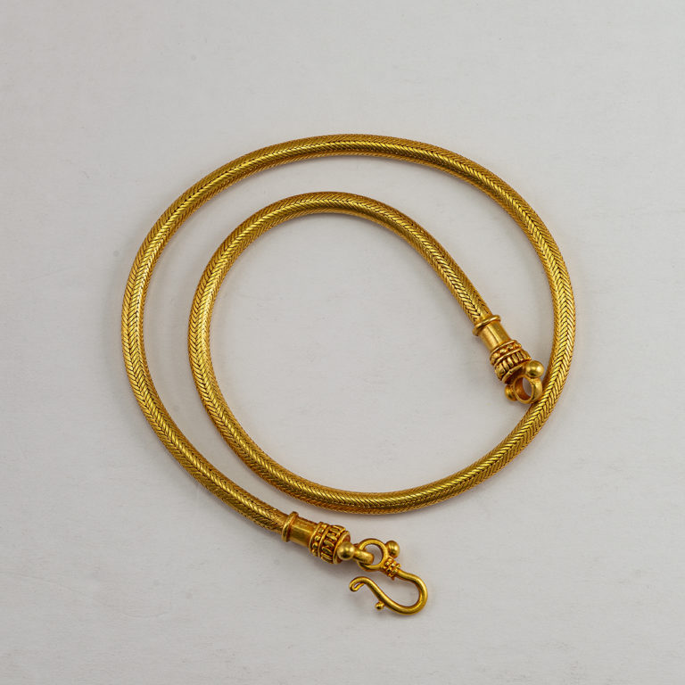 This 22kt woven gold chain is 18" in total length. The weight and the color of this piece is unbelievable.
