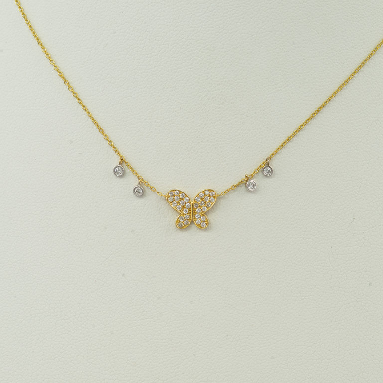 Butterfly pendant in 14kt yellow gold with diamond accents. The gold is 14kt and the diamonds are round, brilliant cut.