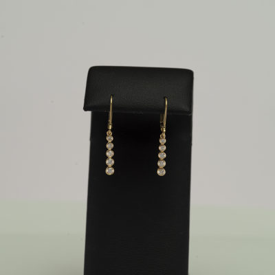 Here we have a pair of diamond earrings. The earrings have been made using 14kt yellow gold. The total carat weight is .48cts.