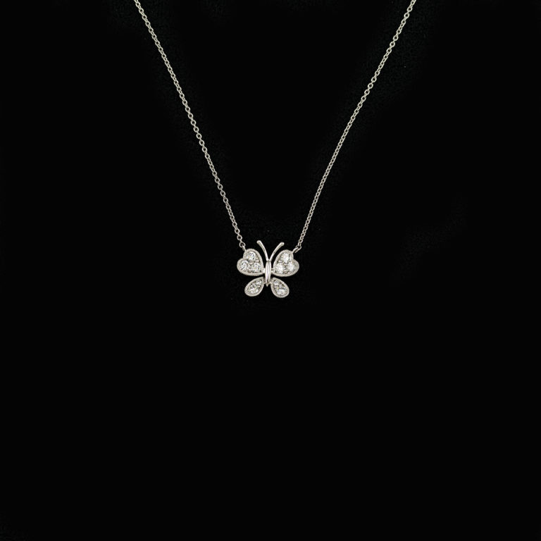 This diamond butterfly necklace was made with 14kt white gold. There are .37ct of diamond accents. The chain is included in the price.