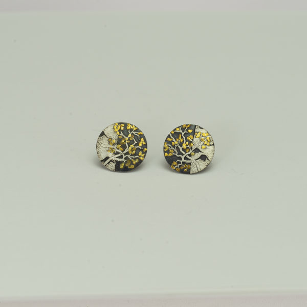 This aspen studs have been handcrafted by Wolfgang Vaatz. They were made with argentium silver, sterling silver and 24kt placer gold.